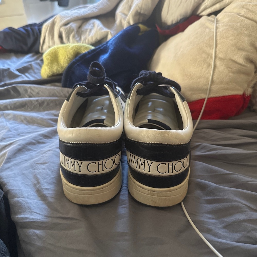 Lightly worn leather trainers